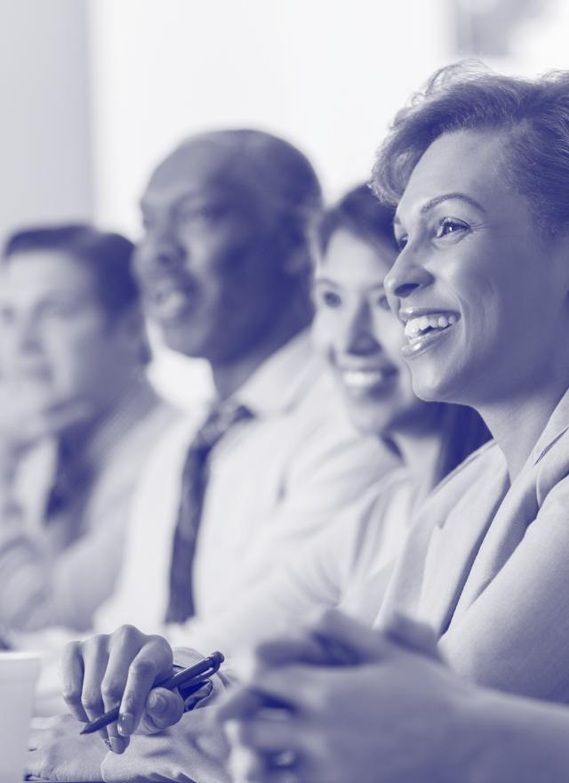 Group of people at a conference table