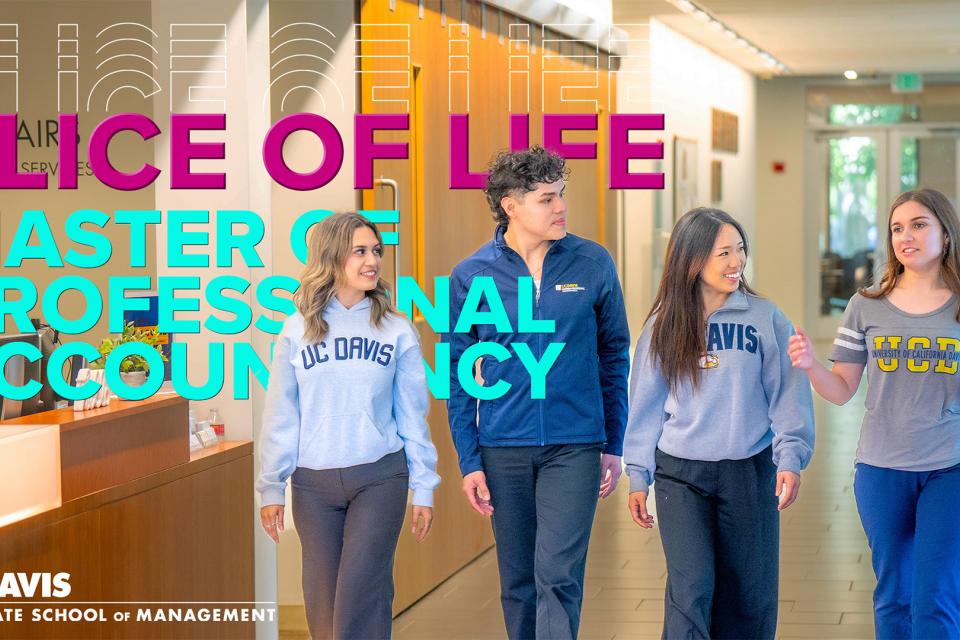 Four students wearing UC Davis sweaters in Gallagher Hall